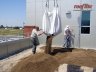 Emptying a super sack of rooflite semi-intensive