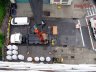 Forklift placing pallets of rooflite extensive mc in super sacks into poisition to lift with crane